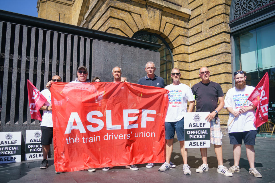 Picketing Aslef members at a picket line at Kings Cross station in London, as members of the drivers union Aslef at nine train operators walk out for 24 hours over pay. Picture date: Saturday August 13, 2022. (Photo by Dominic Lipinski/PA Images via Getty Images)