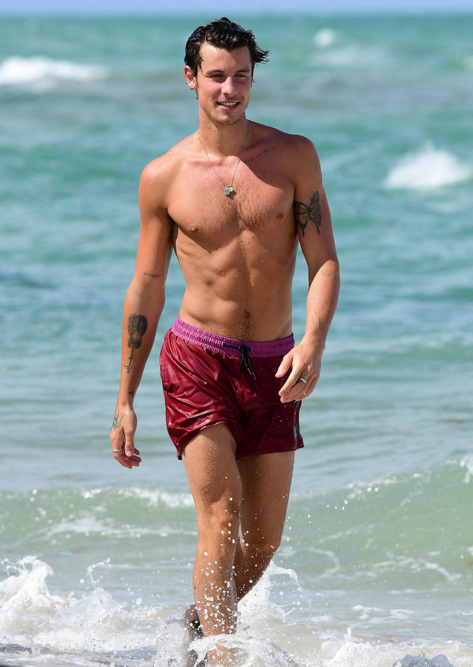 <p>Shawn Mendes sports a smile while hanging in the water in Miami on the eve of his 24th birthday, Aug. 7. </p>