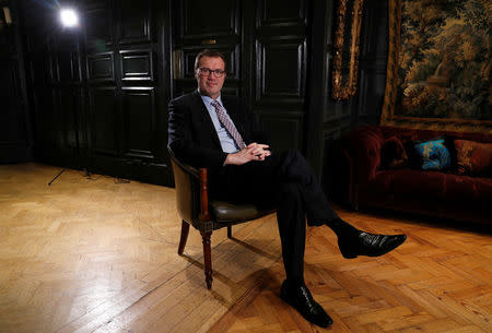 Royal biographer Andrew Morton poses for a photograph following an interview with Reuters journalists in London, Britain April 9, 2018. Picture taken April 9, 2018. REUTERS/Peter Nicholls