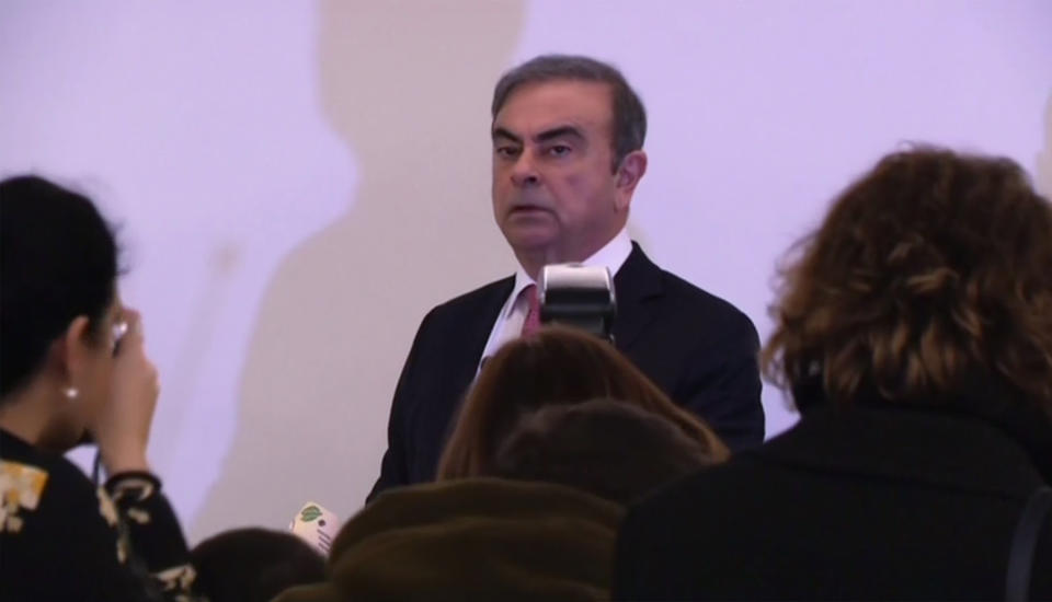An image grab taken from an AFP video shows former Nissan chief Carlos Ghosn arriving to hold a press conference in Beirut on January 8, 2020, the first by the fugitive car magnate since his escape from trial in Japan. (Photo by - / AFP) (Photo by -/AFP via Getty Images)