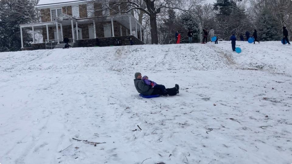 Matt Senese and daughter Adelyn, 4, sled at Bolton Mansion in Levittown on Tuesday, Jan. 16, 2024. It’s considered the best sledding hill in Levittown.