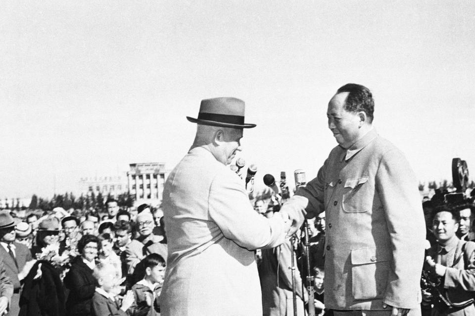 FILE - Mao Tze-Tung welcomes Soviet Premier Nikita Khrushchev to Beijing, Sept. 30, 1959. China’s leader Xi Jinping just concluded his three-day visit with Russian President Vladimir Putin, a warm affair in which the two men praised each other and spoke of a profound friendship. It’s a high in a complicated, centuries-long relationship in which the two countries have been allies and enemies.(AP Photo, File)