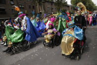 <p>Costumed revellers perform in the parade during the Notting Hill Carnival in London, Monday, Aug. 27, 2018. (Photo: Tim Ireland/AP) </p>