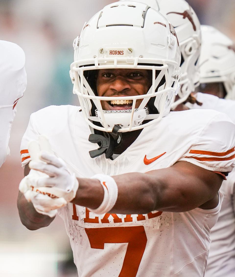 Texas wide receiver Isaiah Bond celebrates a fourth-quarter touchdown catch Saturday in the spring game. The Alabama transfer is expected to play a key role in this coming season's offense.