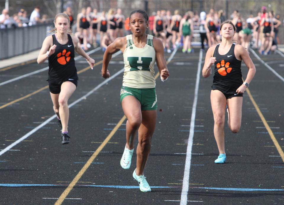Howell's Tianna Bennett (center) is one of the top sprinters in Livingston County.