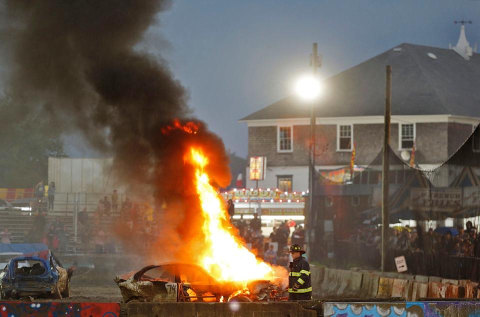 A car caught fire during demolition derby at the Marshfield Fair on Friday, Aug. 26, 2022.