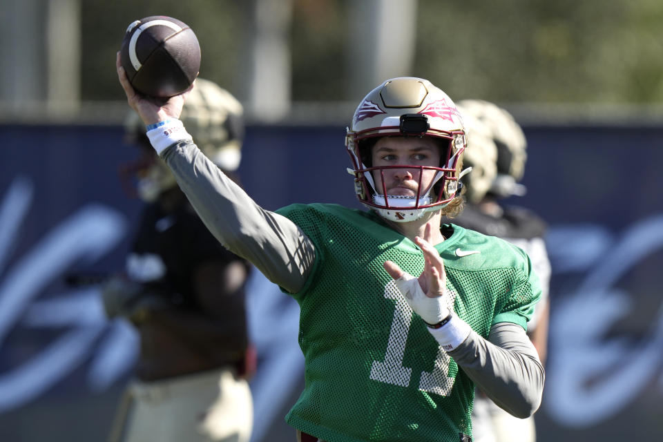Florida State quarterback Brock Glenn (11) does drills in preparation for the Orange Bowl NCAA college football game, Wednesday, Dec. 27, 2023, in Davie, Fla. Florida State is scheduled to play Georgia in the Orange Bowl Saturday at Hard Rock Stadium in Miami Gardens. (AP Photo/Lynne Sladky)