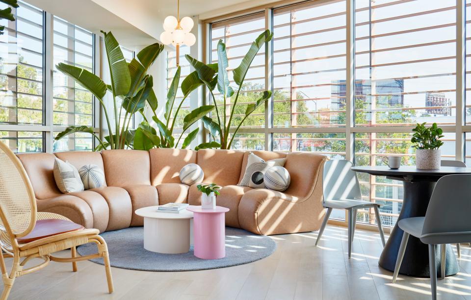 Take cues from the welcoming waiting area and furnish your own space with rounded-edge furniture, natural materials like rattan, and plenty of greenery.