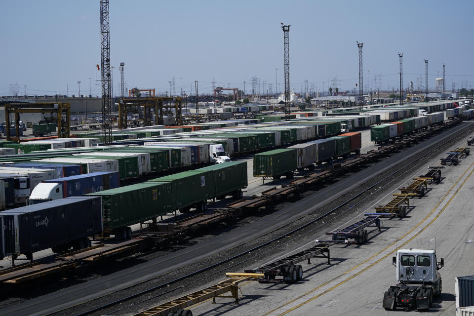 FILE - Freight train cars sit in a Union Pacific rail yard on Wednesday, Sept. 14, 2022, in Commerce, Calif. Rail unions want railroads to take some of the billions they’re using every year to buy back their stock and use it to improve safety in the wake of several high-profile derailments and hire more workers. (AP Photo/Ashley Landis, File)