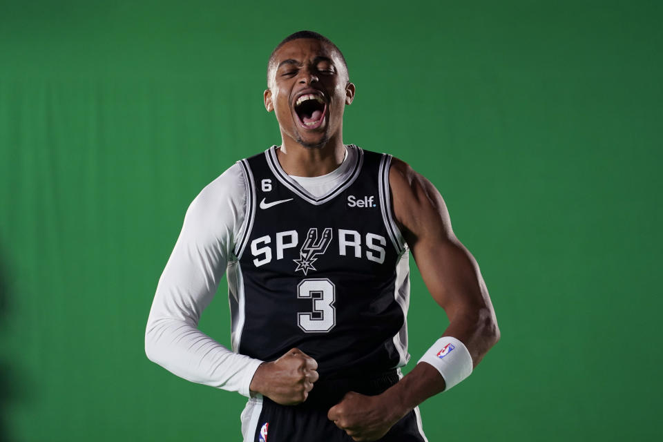 San Antonio Spurs forward Keldon Johnson (3) poses for photos during the team's NBA basketball Media Day, Monday, Sept. 26, 2022, in San Antonio. (AP Photo/Eric Gay)