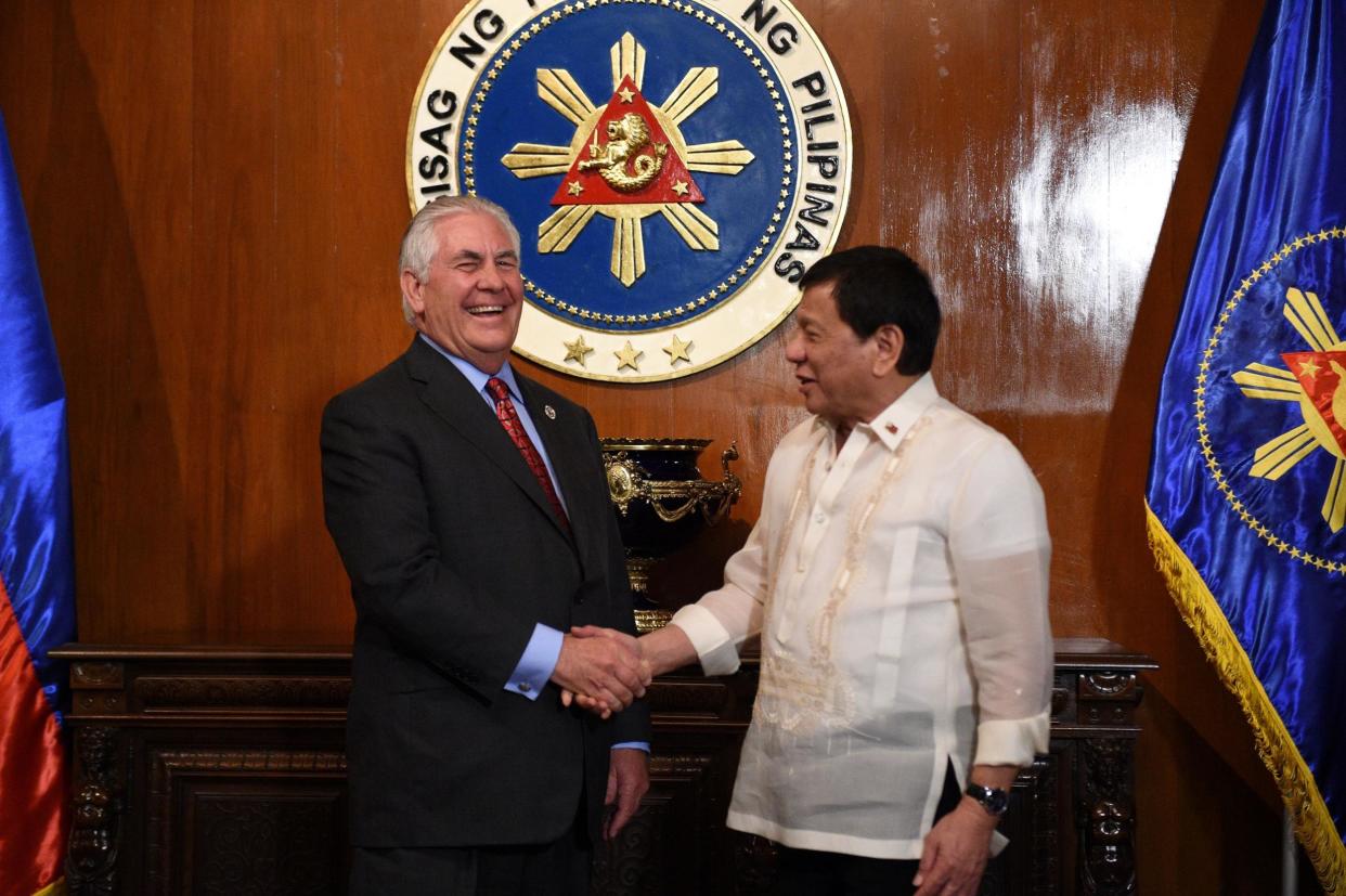 Philippine President Rodrigo Duterte shakes hands with US Secretary of State Rex Tillerson prior to their meeting at Malacanang Palace in Manila: ED ALJIBE/AFP/Getty Images