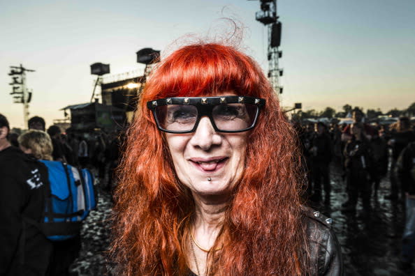 Anik (55), in usual days operating her own shop, attends the Wacken Open Air heavy metal music fest on August 3, 2012 in Wacken, Germany. Approximately 75,000 heavy metal fans from all over the world have descended on the north German village of 1,800 residents for the annual three-day fest. (Photo by Patrick Lux/Getty Images)