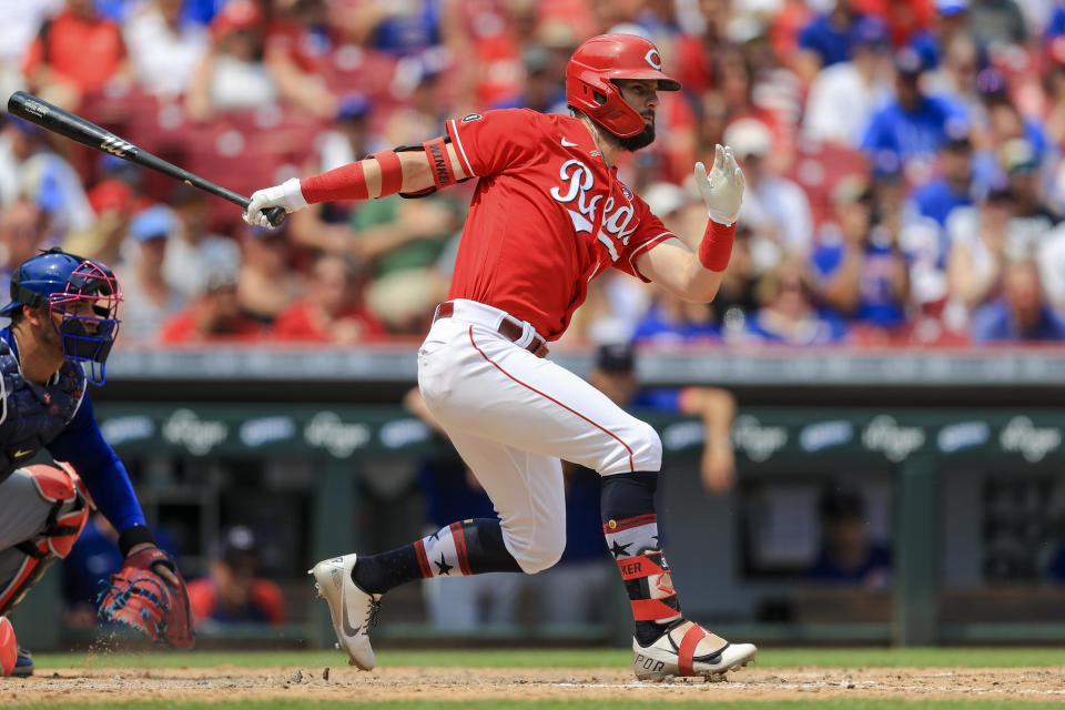 Cincinnati Reds' Jesse Winker watches as he grounds into an RBI-force out during the seventh inning of a baseball game against the Chicago Cubs in Cincinnati, Sunday, July 4, 2021. (AP Photo/Aaron Doster)