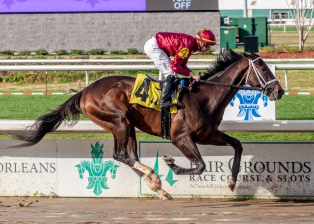 Just a Touch and jockey Florent Geroux win a maiden race at Fair Grounds on Jan. 27.