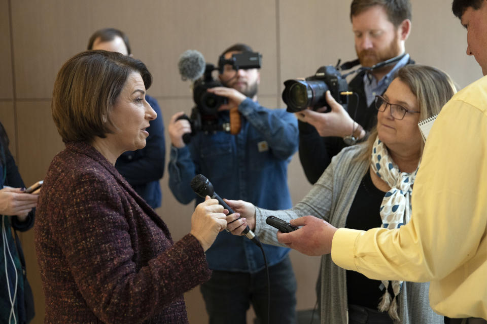 Democratic presidential candidate Sen. Amy Klobuchar, D-Minn., speaks to member of the media before heading back to the Capitol for the impeachment trial of President Donald Trump, Wednesday, Jan. 22, 2020 in Washington. (AP Photo/Pablo Martinez Monsivais)