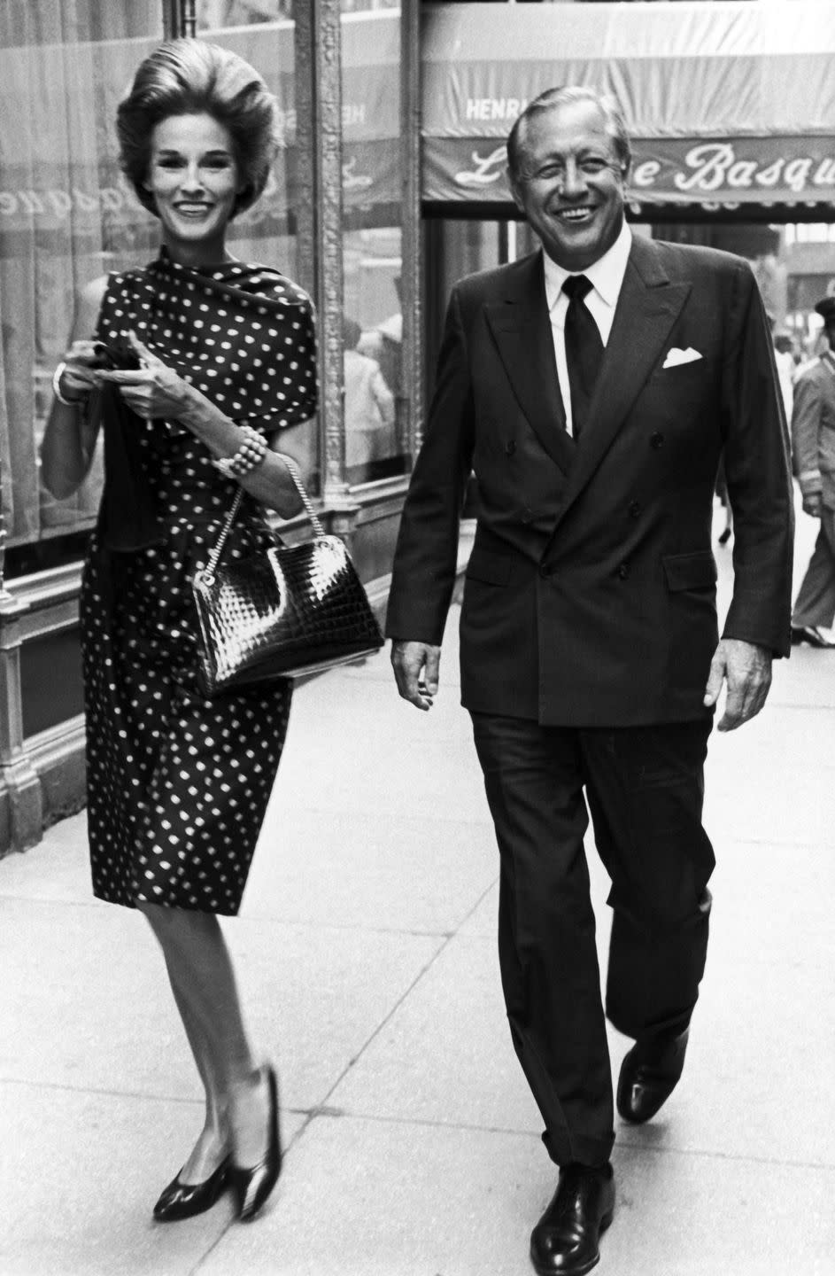 william and babe paley walking on a manhattan street, outside of la cote basque photo by fairchild archivepenske media via getty images