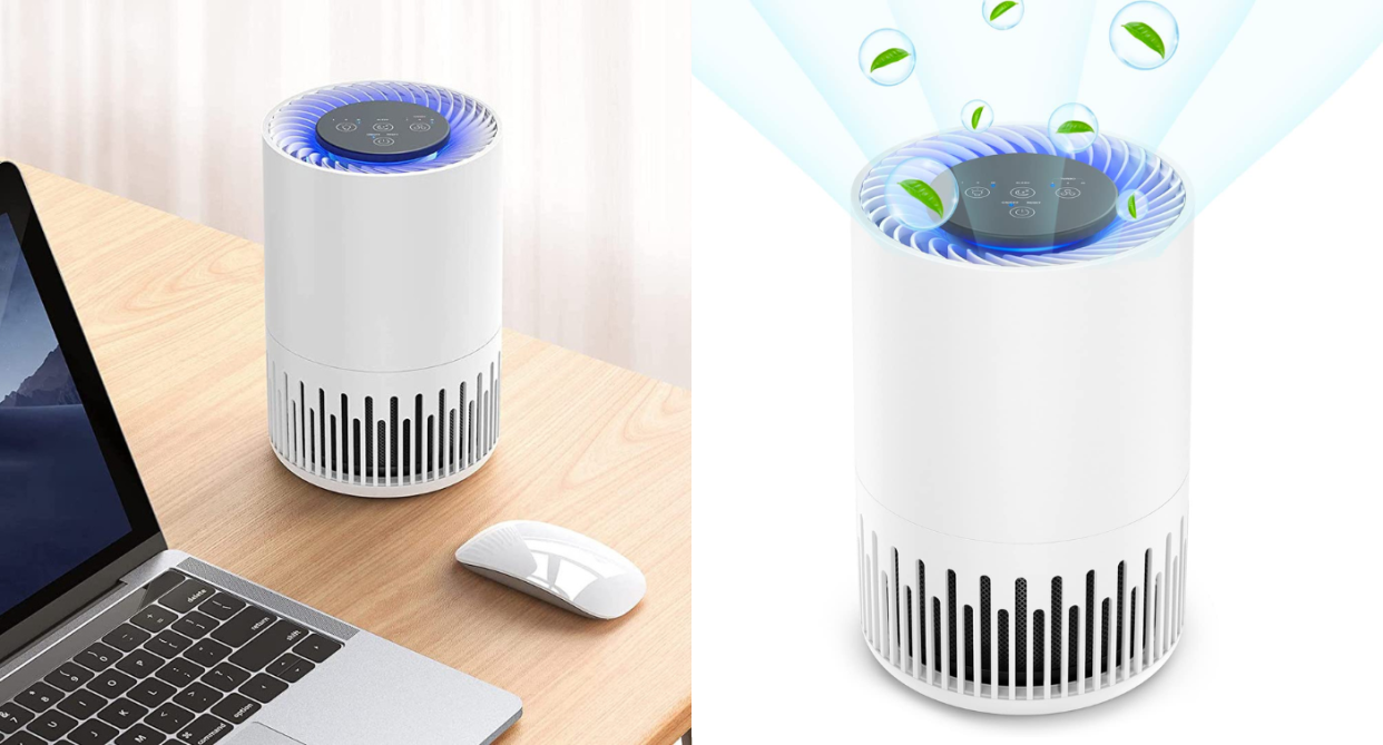 Air purifier. Compact air purifier on desktop.