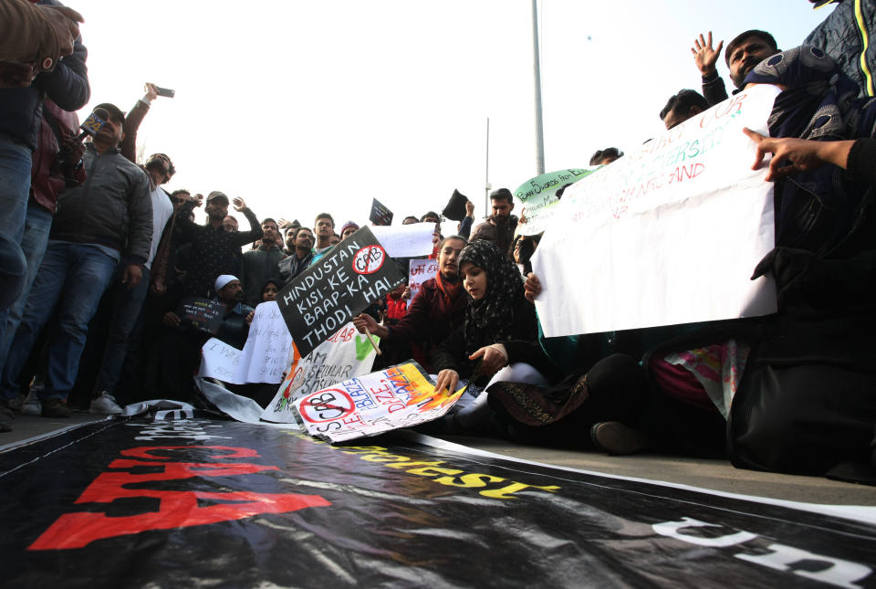 Protesters take part with placards during a demonstration against India's new citizenship law CAA ( Citizenship amandment Act ) in Allahabad on December 19,2019 . Indians defied bans nationwide as anger swells against a citizenship law seen as discriminatory against muslims, following days of protest, clashes, and riots that have left six dead .(Photo by Ritesh Shukla/NurPhoto via Getty Images)