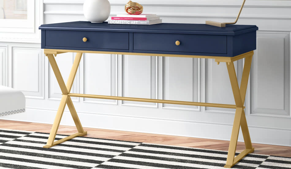 This elegant desk is sturdy and filled with compartments. (Photo: Wayfair)