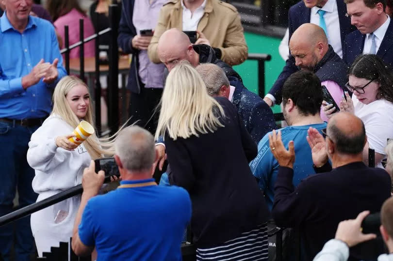 Nigel Farage gets milkshake thrown at him