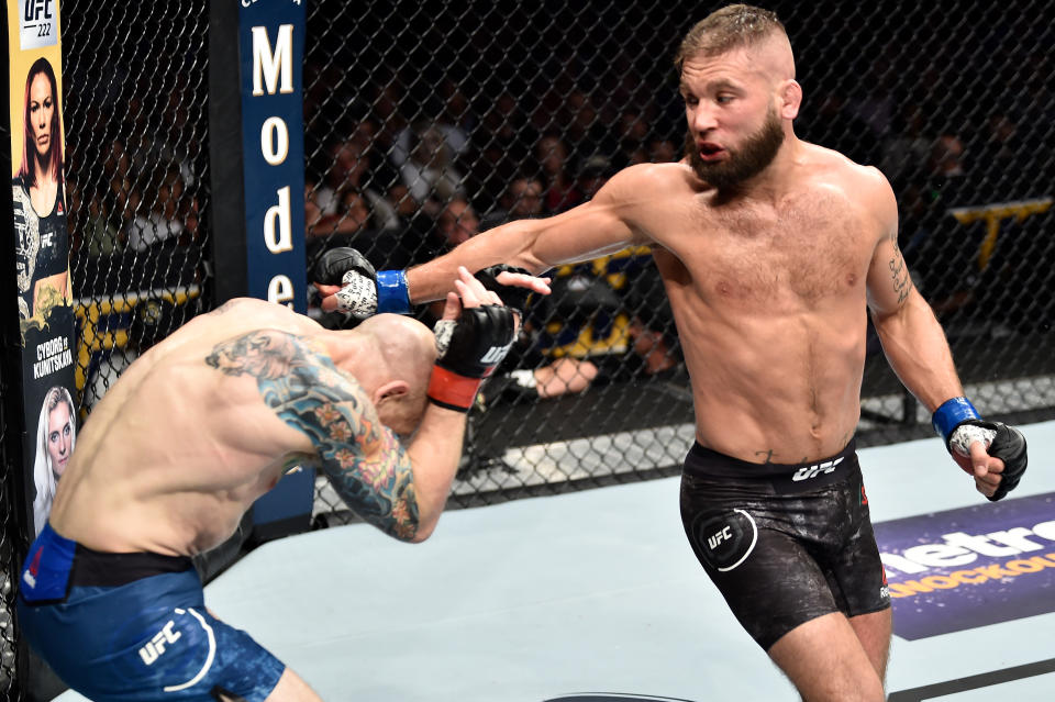 Josh Emmett (L) battles Jeremy Stephens Saturday in a bout Stephens won by second-round finish at the Amway Center in Orlando, Fla. (Getty Images)