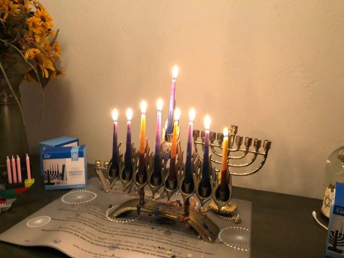 A lit menorah on Hanukkah.