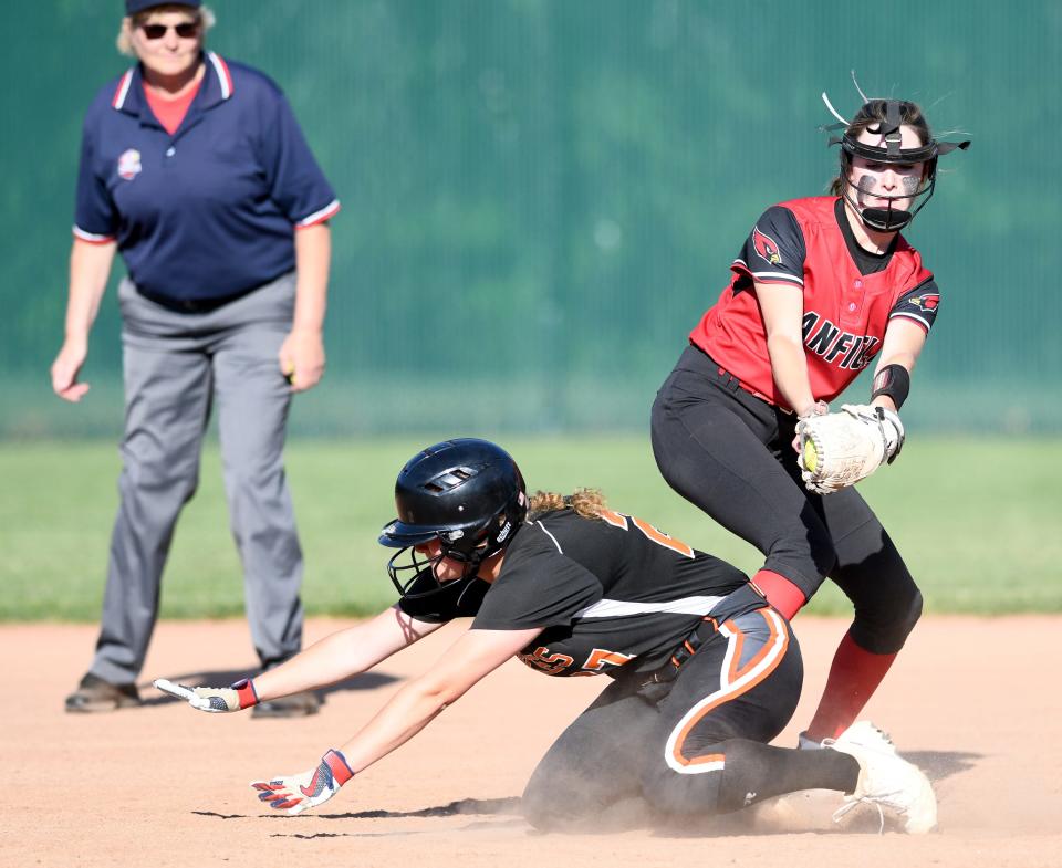 Chyanne Knapp steals second under the tag by Canfield's Marina Koenig in the fifth inning of the Division II regional final, Friday, May 26, 2023, at Nordonia.
