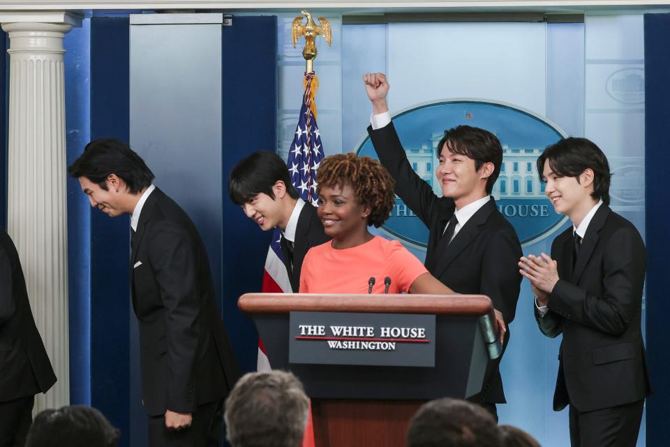 Members of the South Korean pop group BTS leave after speaking at the daily press briefing at the White House.