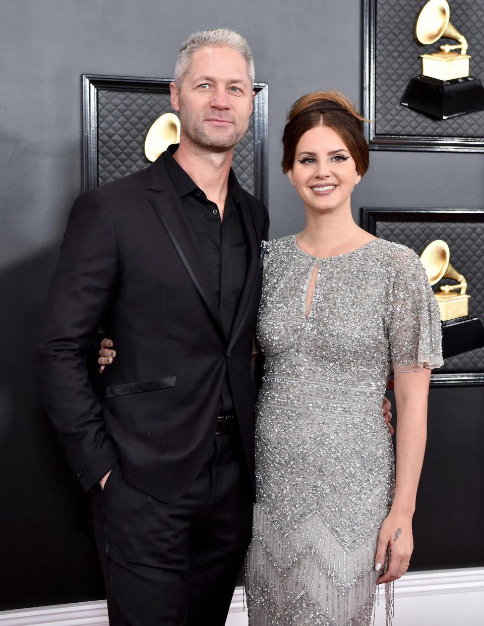 Lana Del Rey attend the 62nd Annual GRAMMY Awards at Staples Center on January 26, 2020 in Los Angeles, California with her boyfriend Sean Larkin (Photo by Axelle/Bauer-Griffin/FilmMagic)