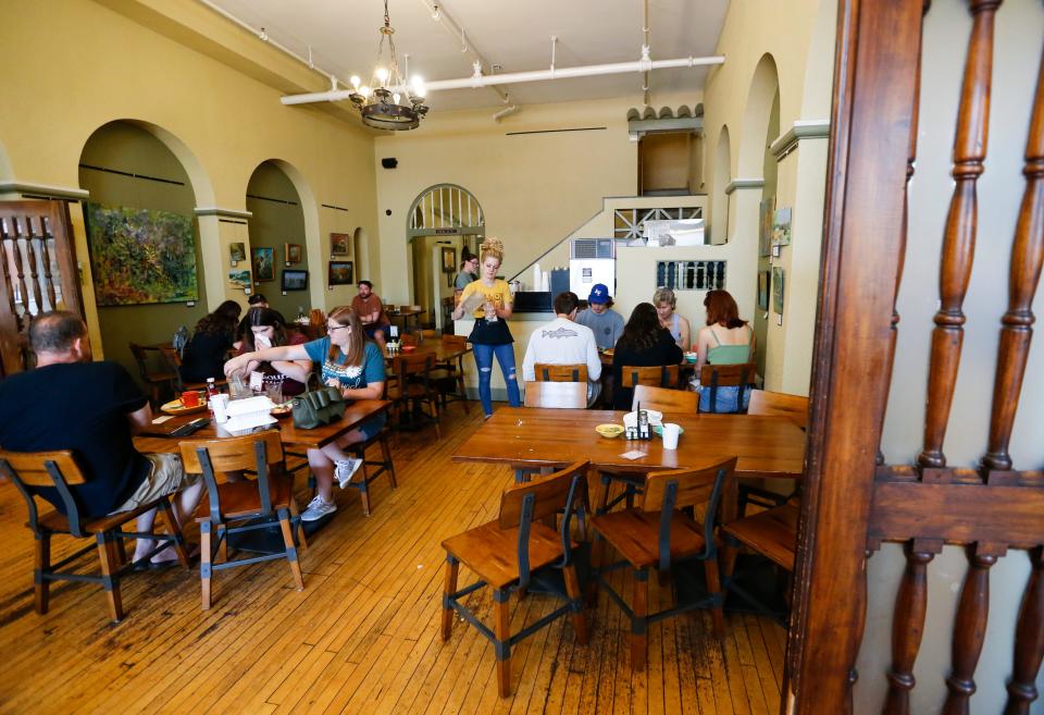 Inside Gailey's Breakfast Cafe on Monday, June 26, 2023. This room was the original lobby of the Seville Hotel.