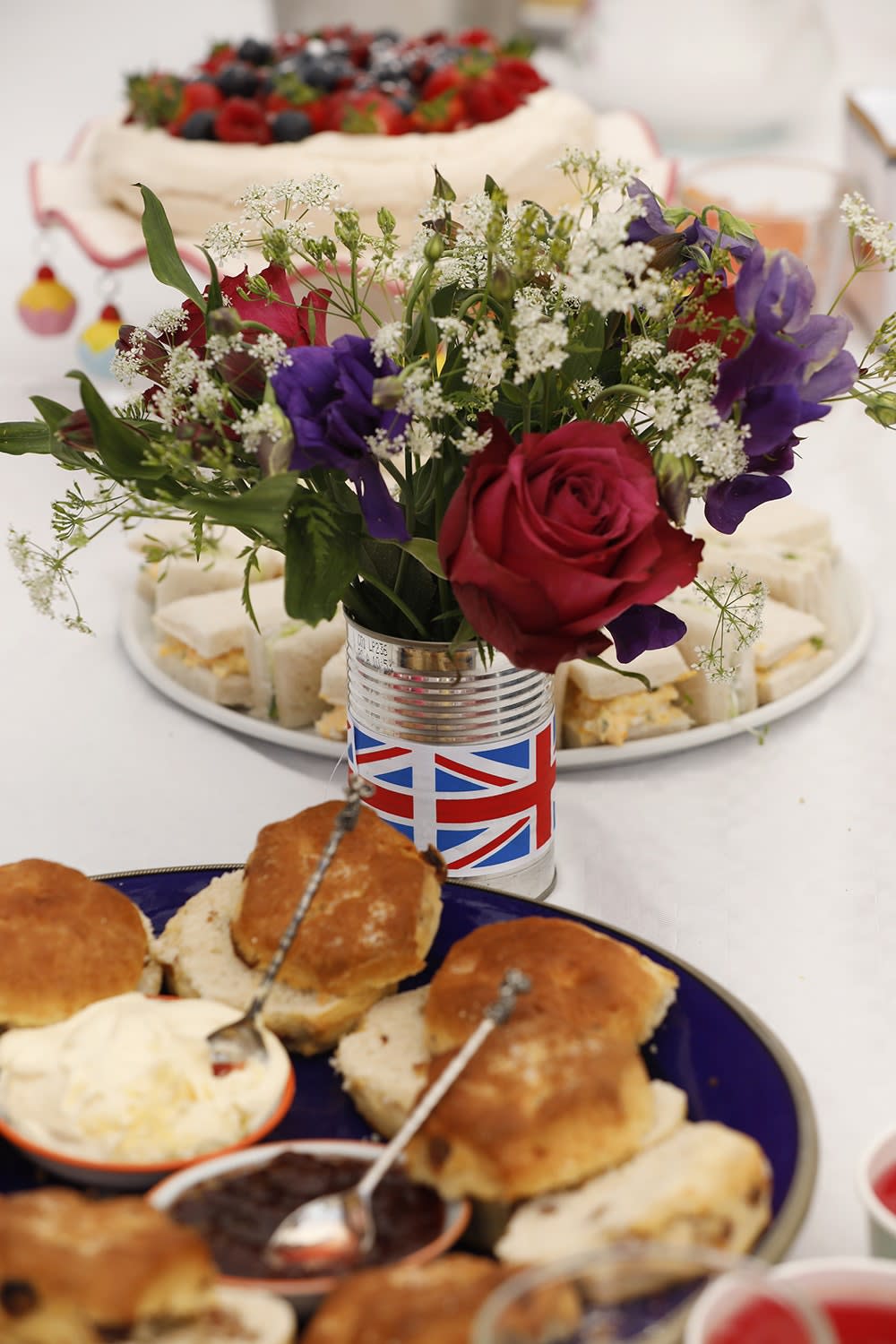 A plate of jam and biscuits