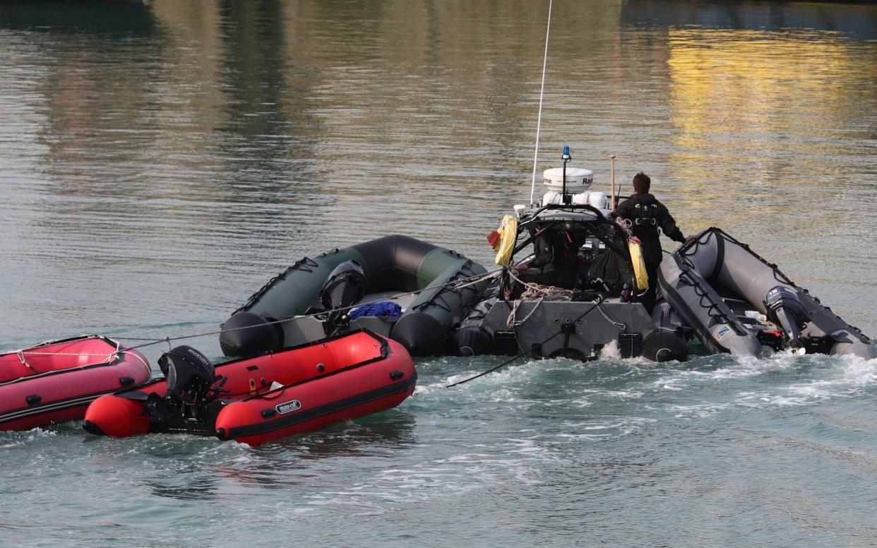 Border force collecting inflatables - Gareth Fuller/PA