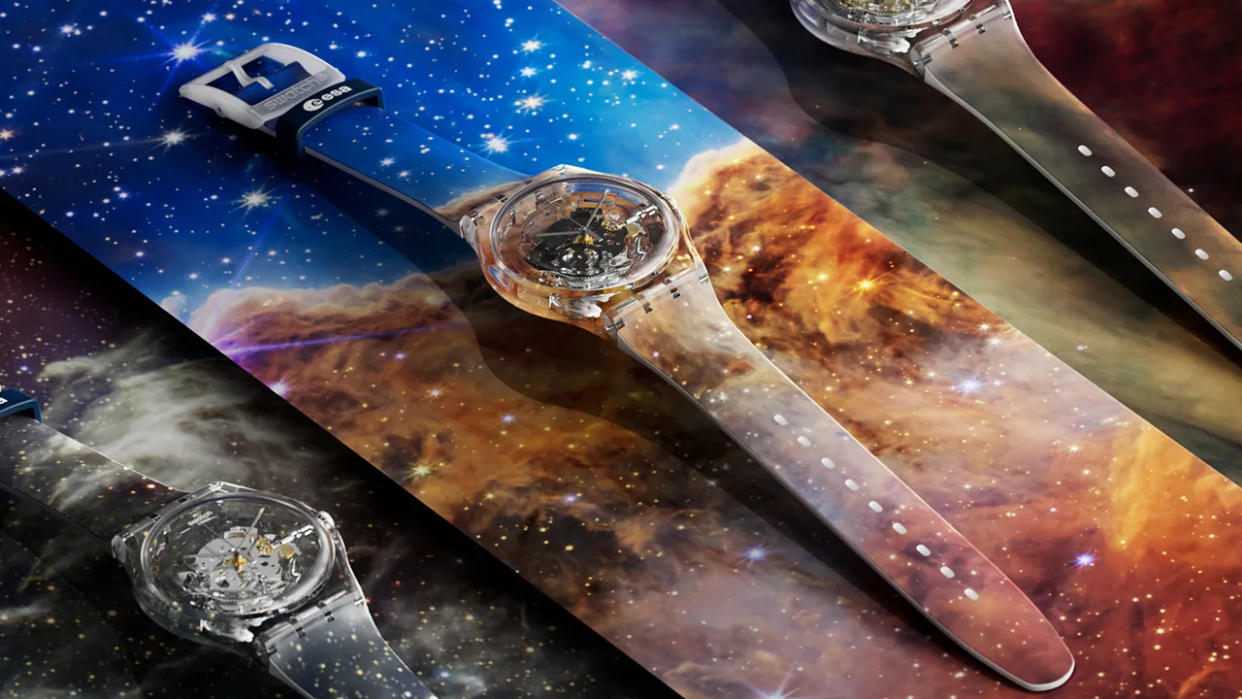  Three different watches with stars and galaxies on them. 
