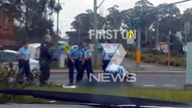 Police work to try and revive the young woman. Photo: 7News