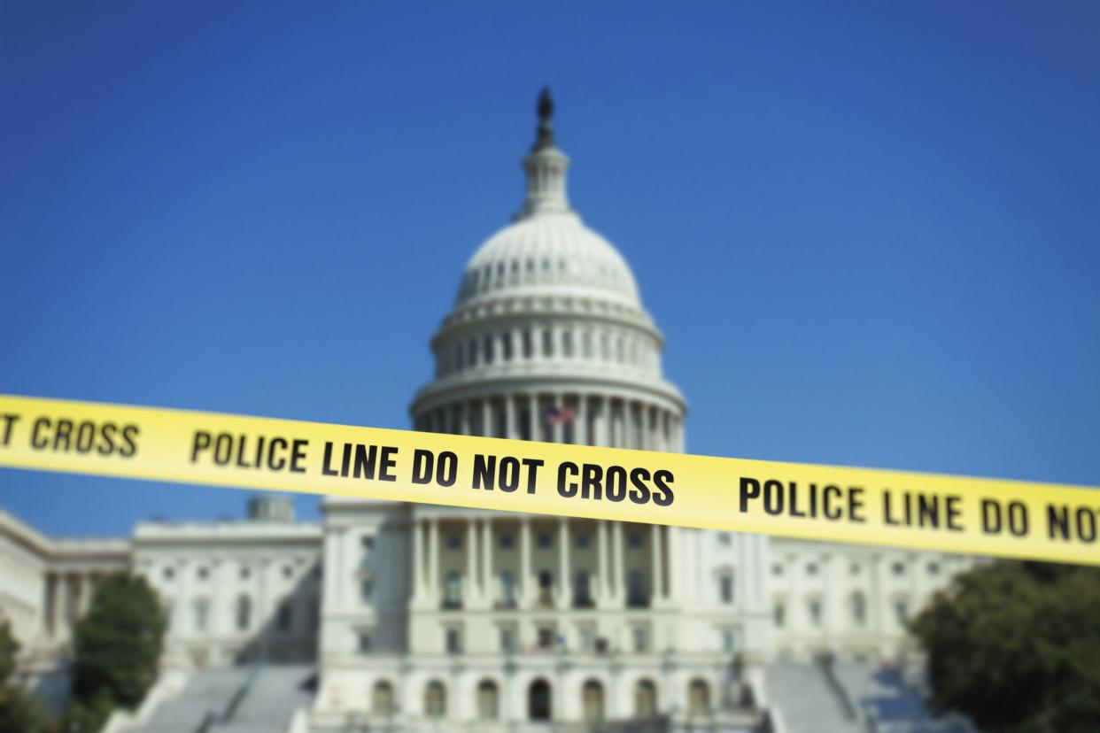 Capitol in Washington DC with police fence tape