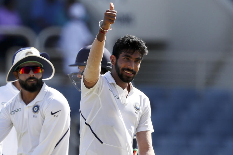 India's Jasprit Bumrah celebrates his hat-trick wicket by the dismissal of West Indies' Roston Chase during day two of the second Test cricket match at Sabina Park cricket ground in Kingston, Jamaica Saturday, Aug. 31, 2019. (AP Photo/Ricardo Mazalan)