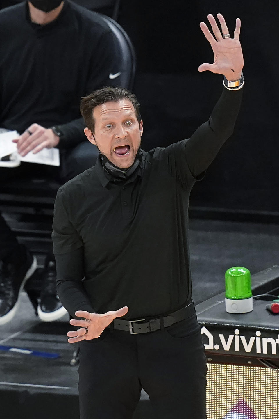 Utah Jazz coach Quin Snyder shouts to the team during the first half of an NBA basketball game against the Atlanta Hawks on Friday, Jan. 15, 2021, in Salt Lake City. (AP Photo/Rick Bowmer)