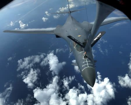 One of two U.S. Air Force B-1B Lancer bombers is refueled during a 10-hour mission flying to the vicinity of Kyushu, Japan, the East China Sea, and the Korean peninsula, over the Pacific Ocean August 8, 2017. U.S. Air Force/Airman 1st Class Gerald Willis/Handout via REUTERS