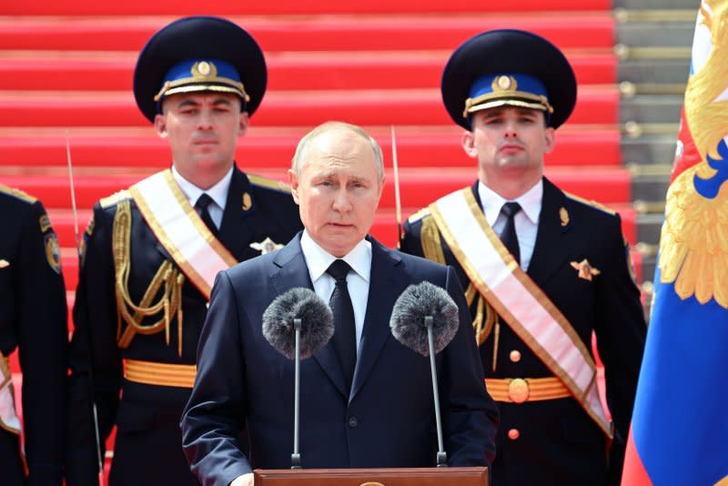 Russian President Vladimir Putin addresses units of the Russian Defense Ministry, the Russian National Guard Troops and others on June 27. File Photo courtesy of Sputnik/Kremlin Pool/EPA-EFE