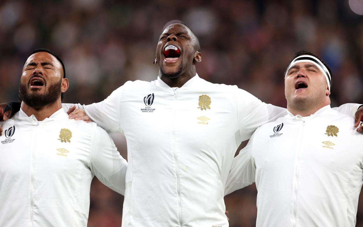 Manu Tuilagi, Maro Itoje and Jamie George of England sing their national anthem prior to the Rugby World Cup 2023 match between England and South Africa