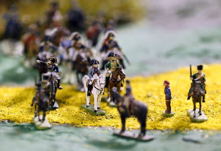 A figurine representing French Emperor Napoleon (C on white horse). REUTERS/Francois Lenoir