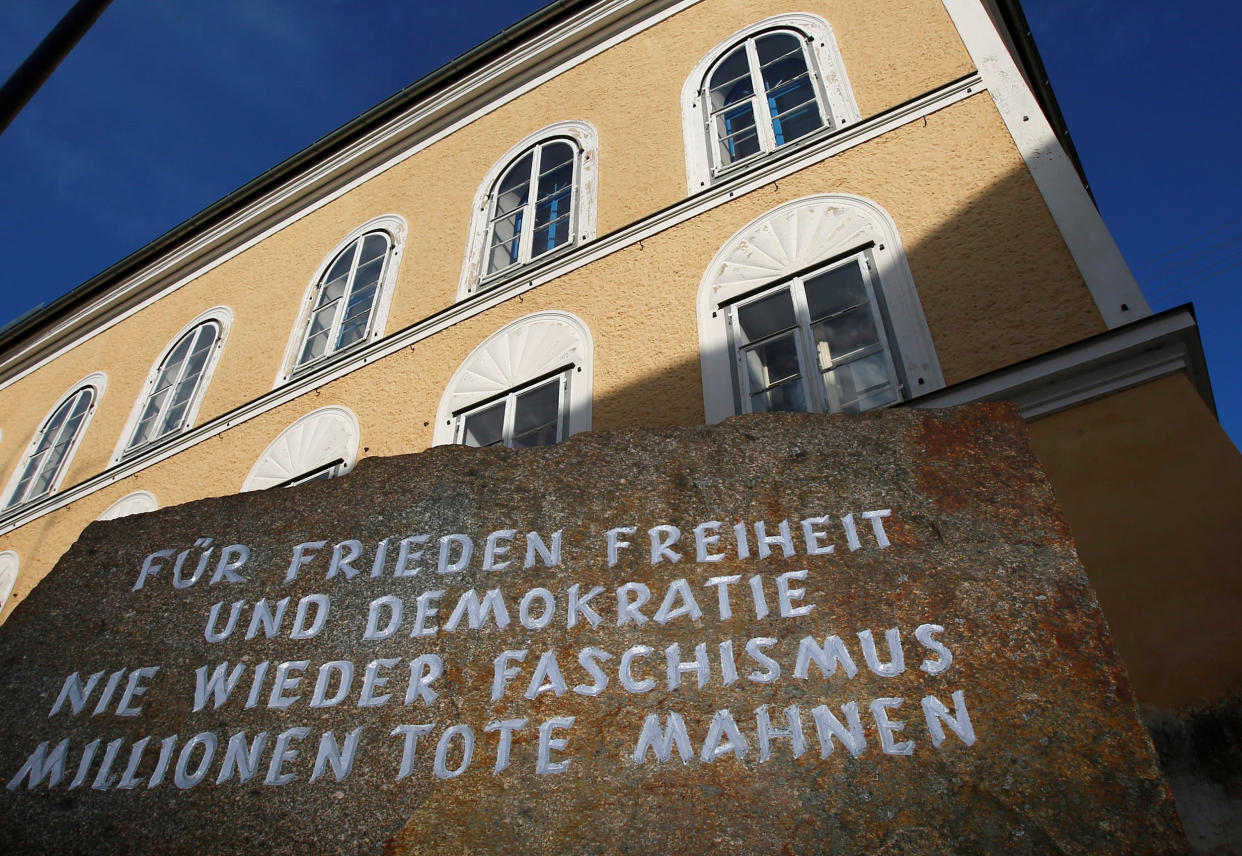 A stone outside the house in which Adolf Hitler was born, with the inscription 'For peace, freedom and democracy, never again fascism, millions of dead are a warning', is pictured in the northern Austrian city of Braunau am Inn September 24, 2012. A suggestion to turn the Austrian house where Adolf Hitler was born into normal residential space has triggered a debate about how best to use an empty property still laden with historic baggage decades after World War Two ended. The man who became Nazi dictator was born in the house in   Braunau on the Inn, a town near Salzburg on the German border, in April 1889. His family lived there only three years, but his link to the three-storey building has left an indelible mark. REUTERS/Dominic Ebenbichler/File Photo