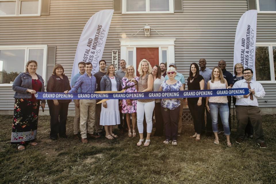 From left to right are Kelley Patterson, Alex & Associates; Mary Henderson, Bank of New Hampshire; Caleb Fleury, Alex & Associates, Ethan Parisi, Alex & Associates; Sarah Ford, Alex & Associates, Matt Champney, Alex & Associates agent; Carrie Alex, cutting the ribbon for Alex & Associates; Alyssa Van Dine, HBL Insurance; Marilyn & Barry Galuska, Carrie Alex’s parents, Christina Donlon, Alex & Associates; Stacy Aube, Alex & Associates; David Robart, Business Communications of Maine; Sharla Rollins, First Seacoast Bank; Ben Coakley, Greater Rochester Chamber of Commerce; as well as friends, family and associates of Carrie Alex.