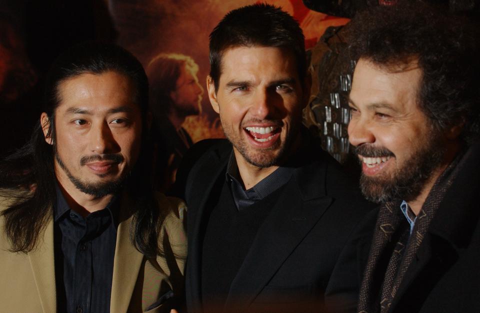 Sanada (left) with Tom Cruise and Last Samurai director Ed Zwick in 2004.