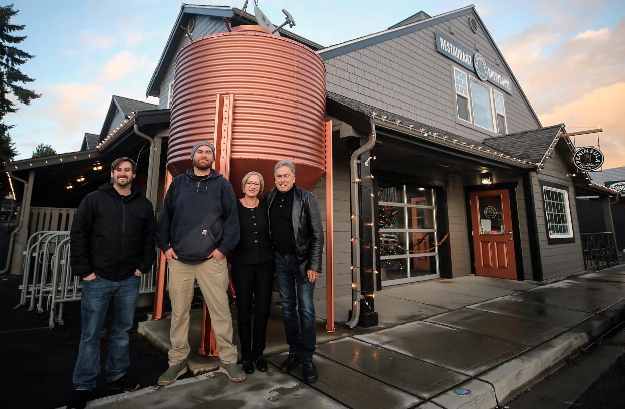 Peninsula BrewHouse co-owners (left to right) Cody Morgan, Tanner Mueller, Sylvia Morgan and Harlan Morgan outside their new location in Old Town Silverdale on Friday.