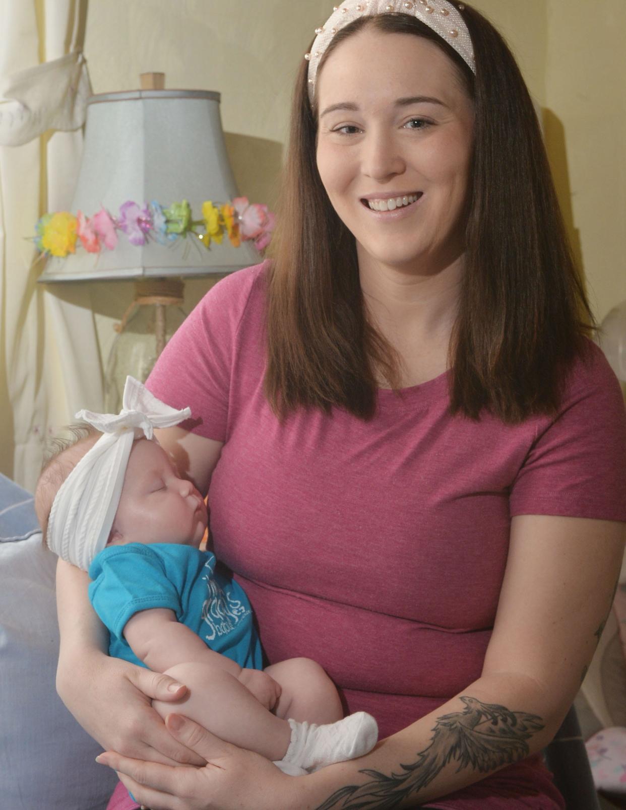 Maria Hodapp, 33, and her infant daughter, Lorelai Edwards, nearly died Feb. 29 when they both suffered unexpected complications during delivery at UPMC's Magee-Women's Hospital. Hodapp credits the team of doctors and nurses with saving both of their lives.