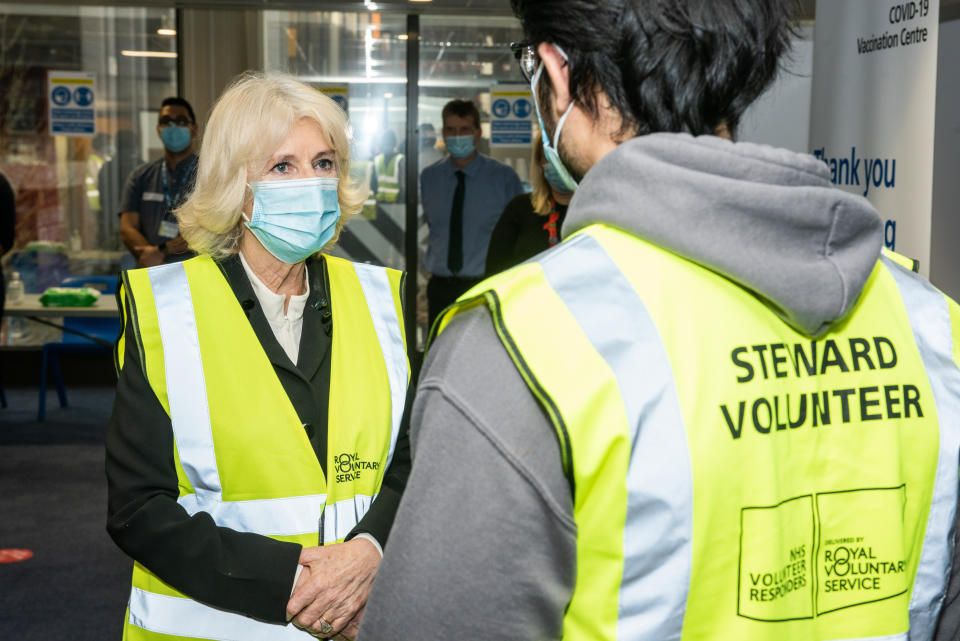 The Duchess of Cornwall, pictured during a visit to the Wembley Vaccination Centre, said she leapt in the air after her jab (Royal Voluntary Service/PA)