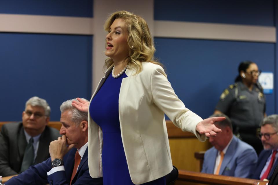ATLANTA, GA - FEBRUARY 15: Attorney Ashleigh Merchant, representing defendant Michael Roman, speaks during a hearing in the case of the State of Georgia v. Donald John Trump at the Fulton County Courthouse on February 15, 2024 in Atlanta, Georgia. Judge Scott McAfee is hearing testimony as to whether DA Fanni Willis and Special Prosecutor Nathan Wade should be disqualified from the case for allegedly lying about a personal relationship. (Photo by Alyssa Pointer-Pool/Getty Images)