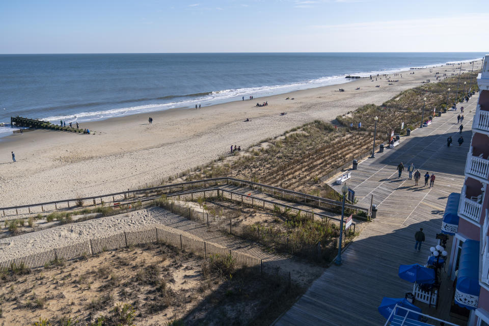 The beach and boardwalk are seen, Friday, Nov. 13, 2020, in Rehoboth Beach, Del. President-elect Joe Biden owns a $2.7 million, Delaware North Shores home with a swimming pool that overlooks Cape Henlopen State Park, is blocks from the ocean and a short drive from downtown Rehoboth Beach.(AP Photo/Alex Brandon)