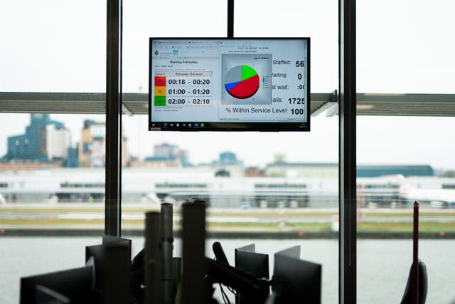 An ambulance wait time screen on display at the LAS emergency operations centre in Newham, east London 